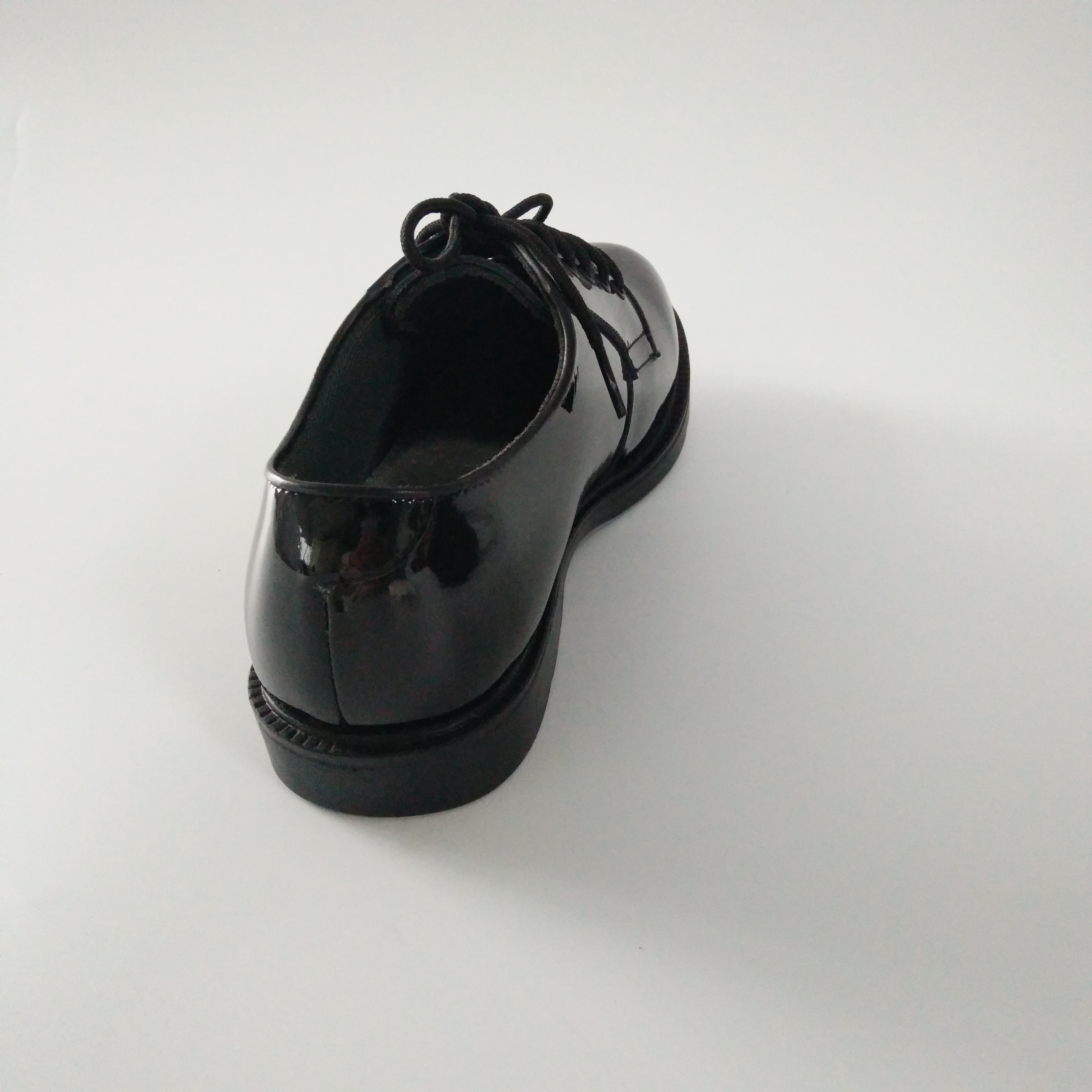 Chaussures de bureau en cuir véritable noires Chaussures en cuir de cérémonie nationales Chaussures d'affaires brillantes